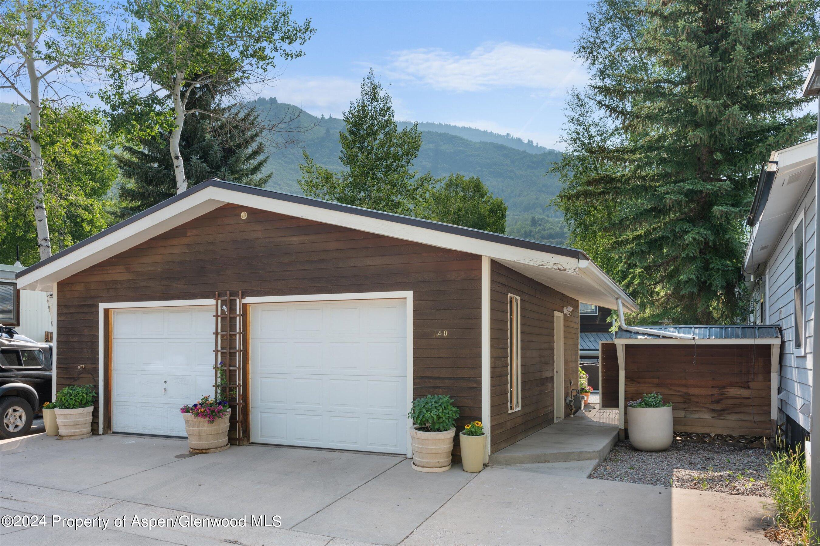 140 Maple Lane Aspen, CO 81611 - Photo 37 of 37 a view of a house with a patio