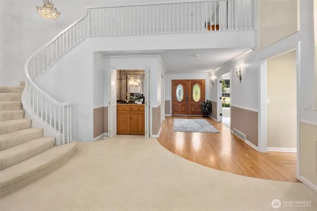 a view of a kitchen with a sink cabinets and a living room