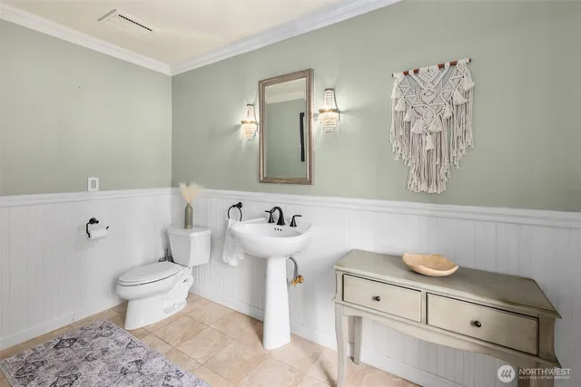 a bathroom with a sink and a toilet