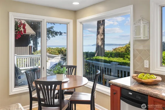 a view of a dining room with furniture a garden and livingroom