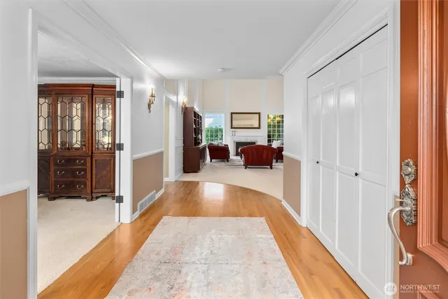 a view of a living room and bathroom