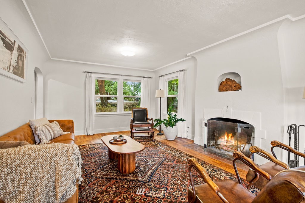 2002 Madrona Point Bremerton, WA 98312 - Photo 11 of 40 a living room with furniture fireplace and window