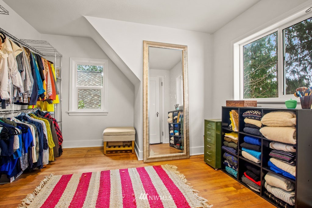 2002 Madrona Point Bremerton, WA 98312 - Photo 17 of 40 a bedroom with a bed and a workspace