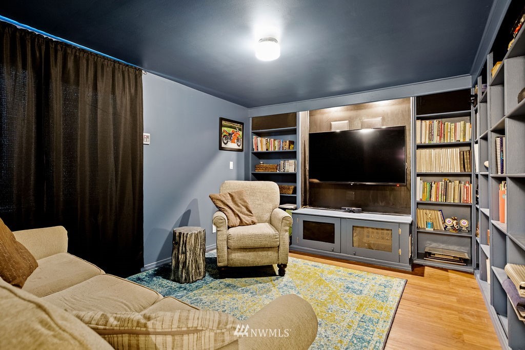 2002 Madrona Point Bremerton, WA 98312 - Photo 19 of 40 a living room with furniture and a flat screen tv