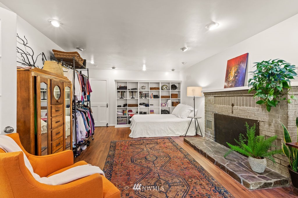 2002 Madrona Point Bremerton, WA 98312 - Photo 23 of 40 a living room with furniture and a fireplace