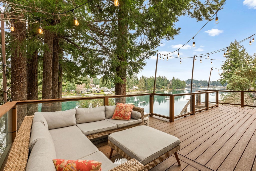 2002 Madrona Point Bremerton, WA 98312 - Photo 26 of 40 a balcony with wooden floor and outdoor seating