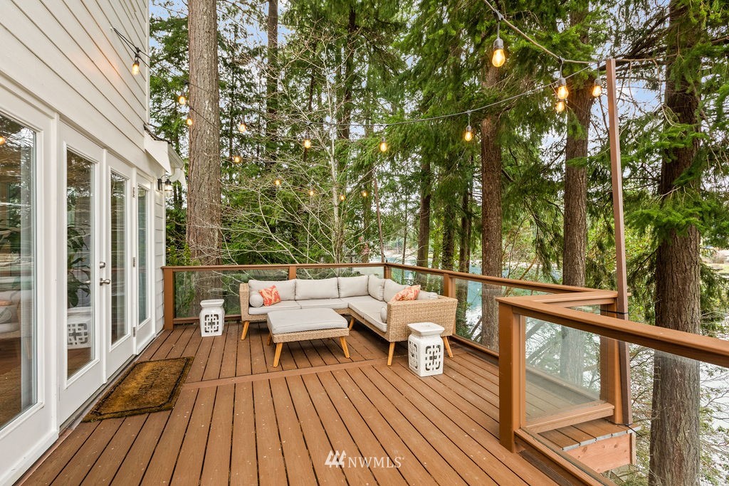 2002 Madrona Point Bremerton, WA 98312 - Photo 27 of 40 a balcony with wooden floor and outdoor seating