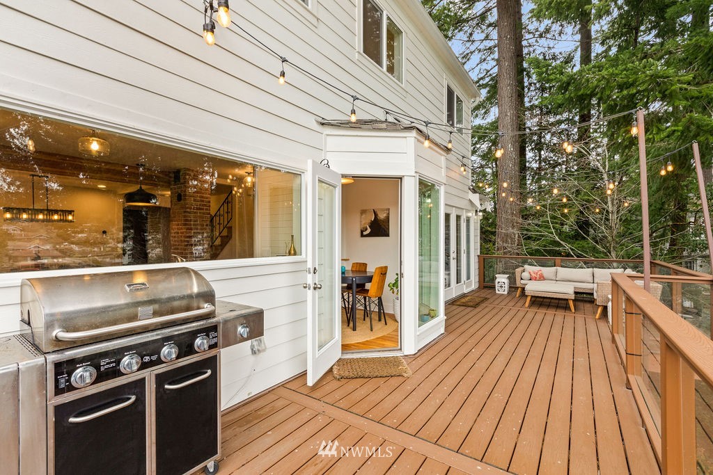 2002 Madrona Point Bremerton, WA 98312 - Photo 28 of 40 a kitchen with a wooden floor and outdoor seating
