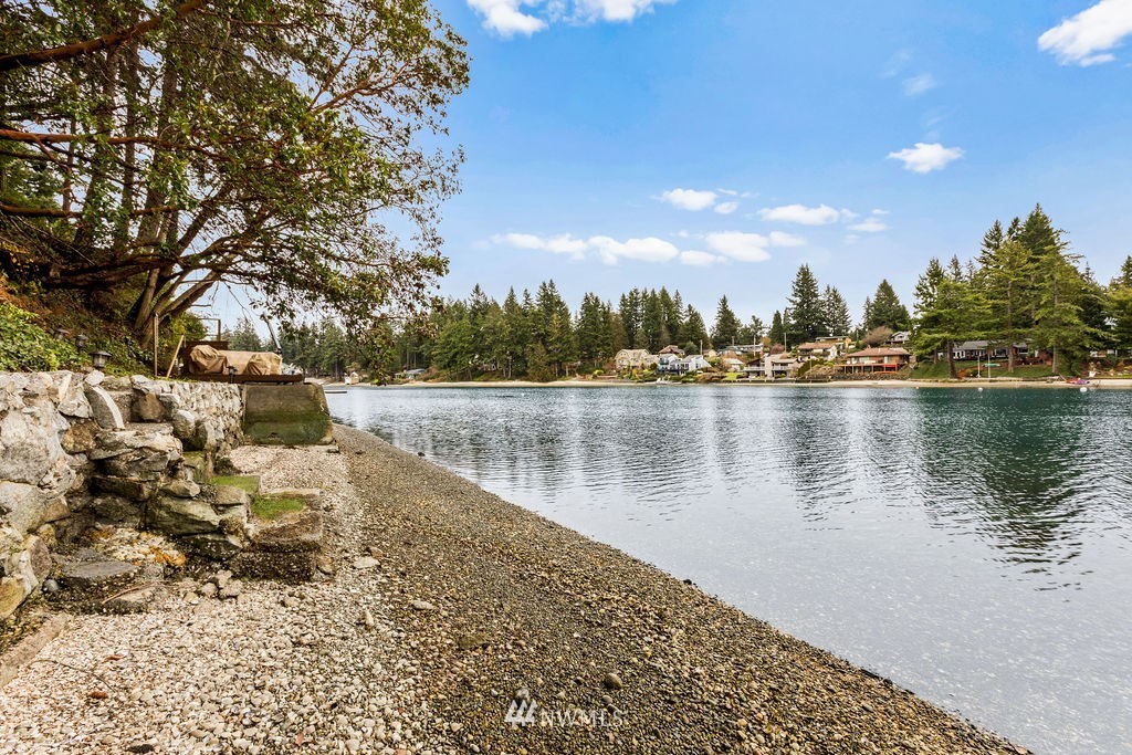 2002 Madrona Point Bremerton, WA 98312 - Photo 36 of 40 a view of a lake with houses in the back