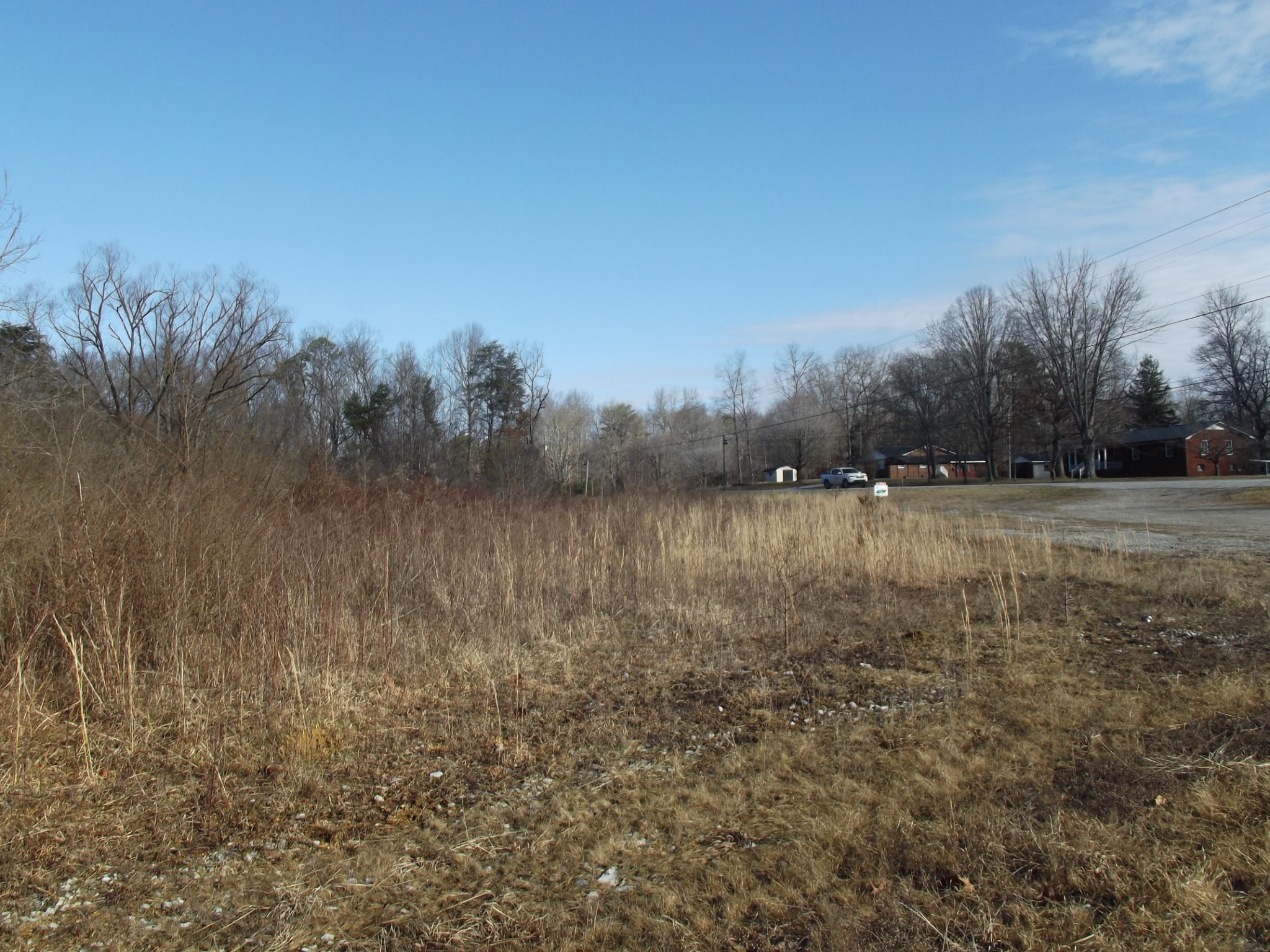 0 Main Street Palmer, TN 37365 - Photo 18 of 35 a view of a lake with houses in the back