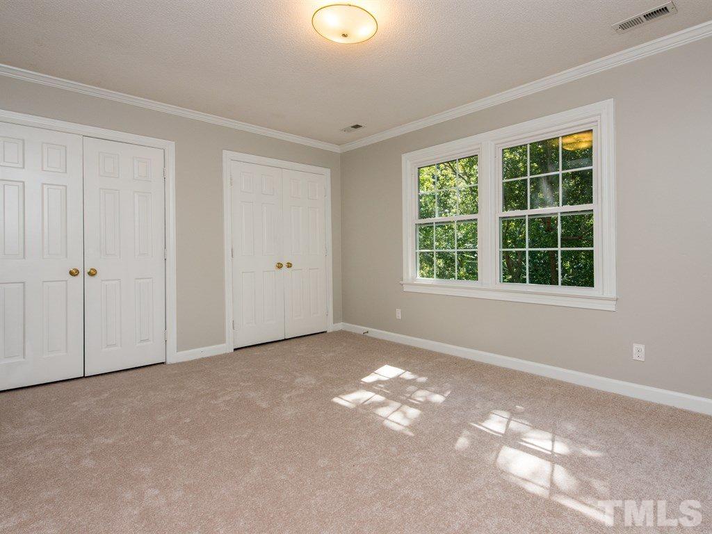 6925 Electra Drive Raleigh, NC 27607 - Photo 17 of 25 an empty room with windows
