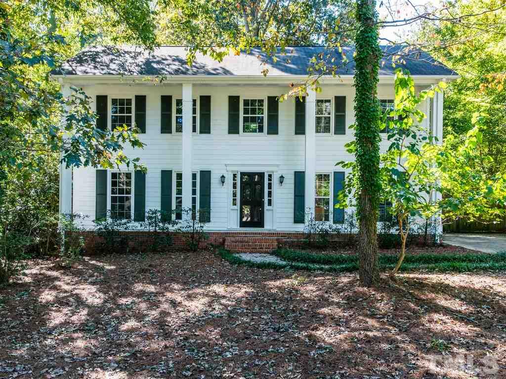 6925 Electra Drive Raleigh, NC 27607 - Photo 23 of 25 a front view of a house with garden