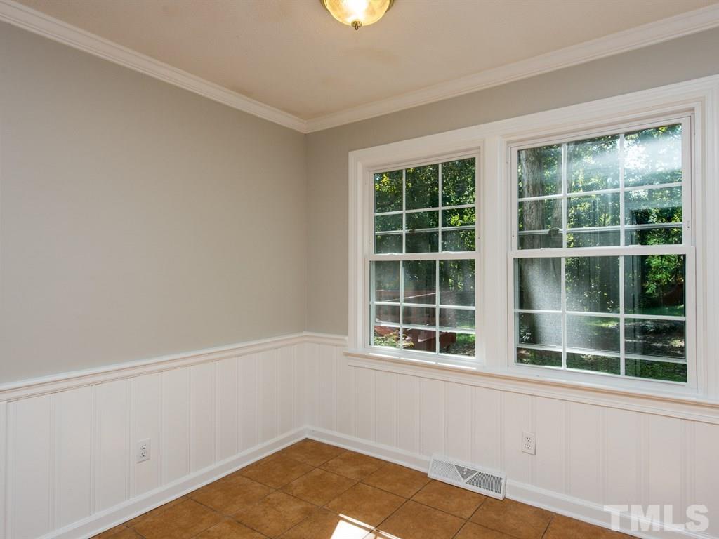 6925 Electra Drive Raleigh, NC 27607 - Photo 8 of 25 a view of an empty room with a window