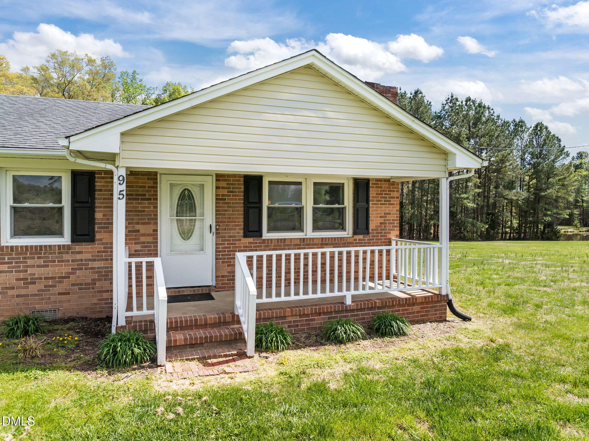 95 Harold Gill Road Roxboro, NC 27574 - Photo 48 of 53 a view of a house with a yard