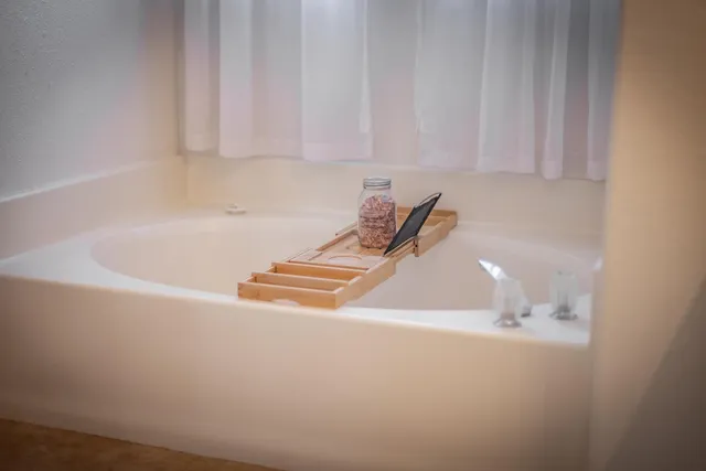 a bathroom with a bathtub