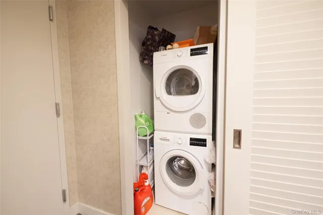 a utility room with dryer and washer