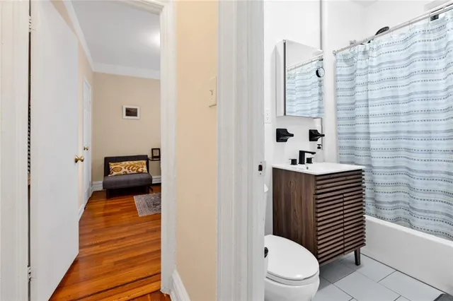 a bathroom with a sink and toilet