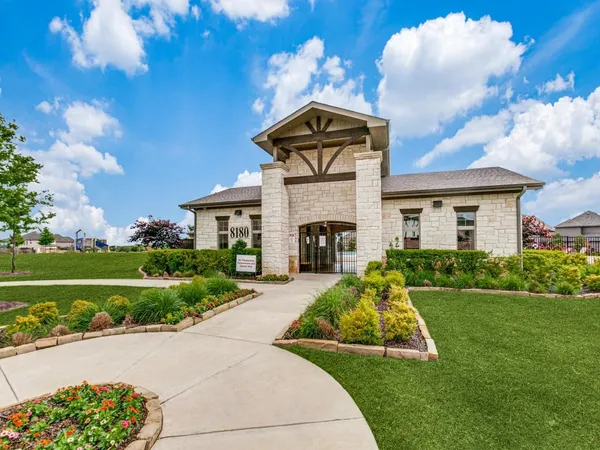 a house view with a garden space