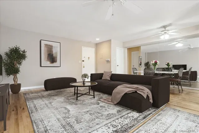 a living room with furniture window and a table