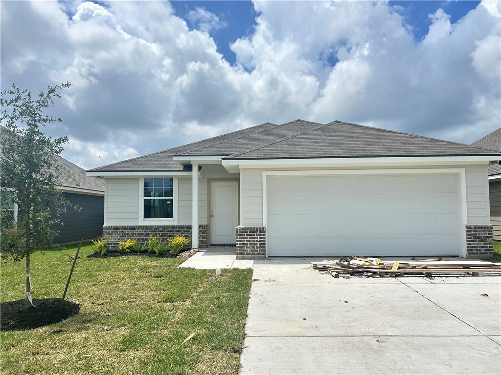 2791 Messenger Way Bryan, TX 77803 - Photo 1 of 15 a backyard of a house with potted plants