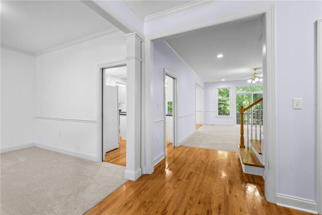 110 Brookstone Way Central, SC 29630 - Photo 3 of 46 Bright interior features warm wood flooring and elegant architectural details.