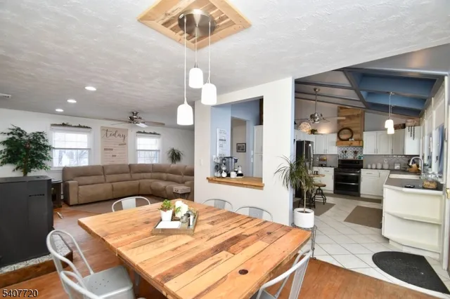 a view of a dining room with furniture