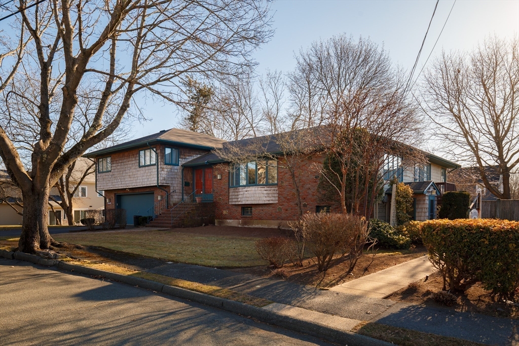 11 Angenica Terrace Marblehead, MA 01945 - Photo 4 of 8 a view of a house with a yard covered in snow