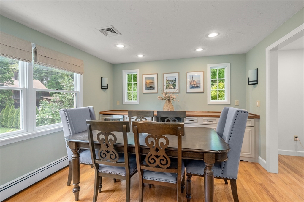 322 Concord Road Wayland, MA 01778 - Photo 5 of 35 a view of a dining room with furniture window and wooden floor