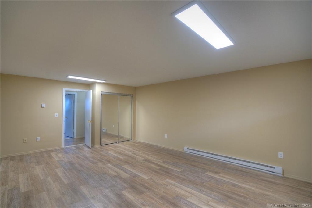 528 Shennecossett Road, Unit 14 Groton, CT 06340 - Photo 18 of 18 a view of an empty room and window