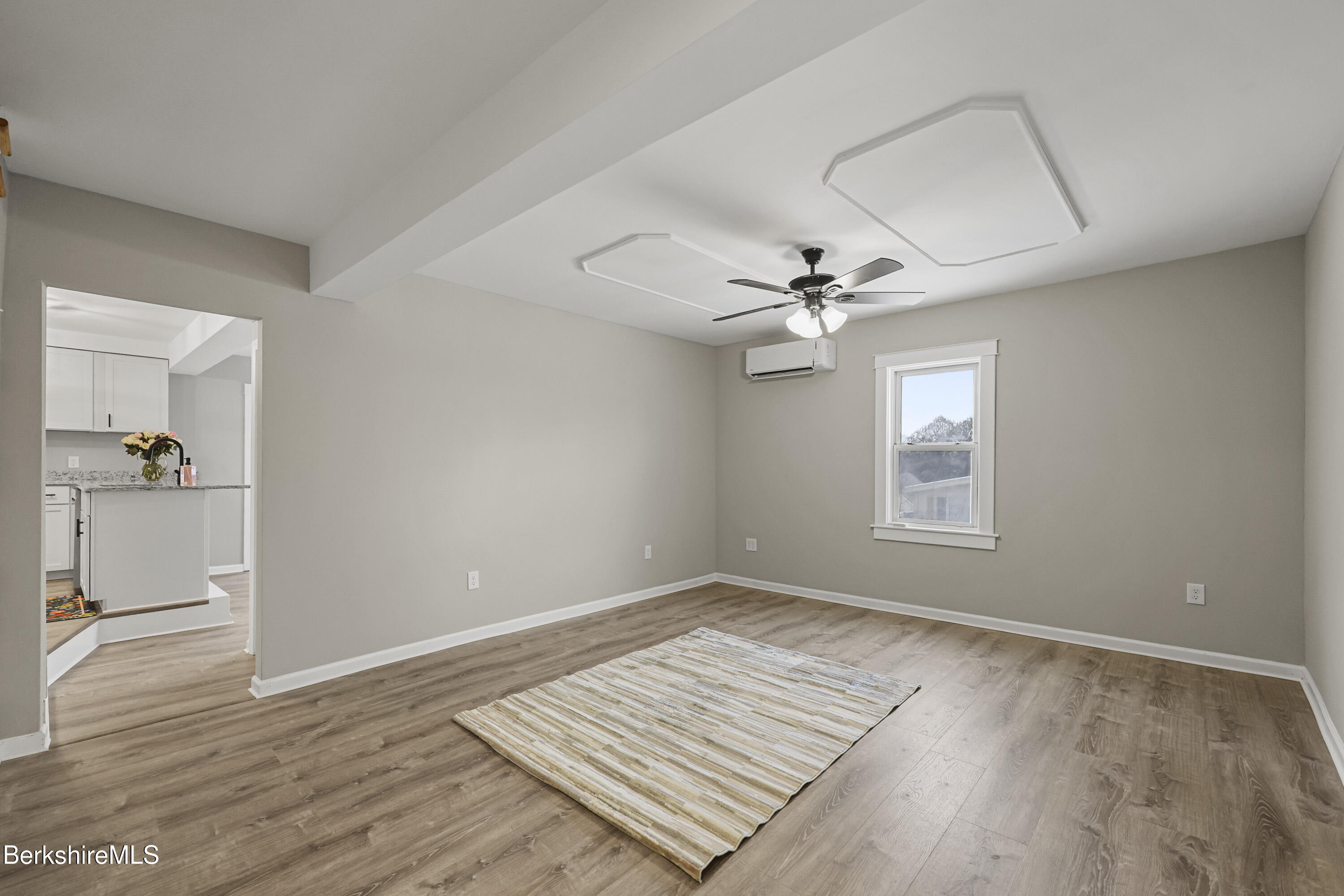 123 Broadview Terrace Pittsfield, MA 01201 - Photo 16 of 34 a view of an empty room with a window and wooden floor