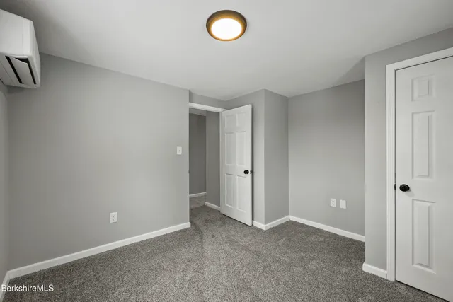 a view of livingroom with furniture and windows