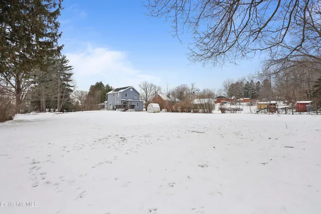 a view of an empty room with storage