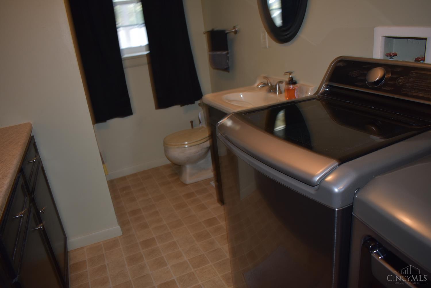 719 Reed Road Sabina, OH 45169 - Photo 40 of 57 Full bath shower, vanity, commode lower level utility room