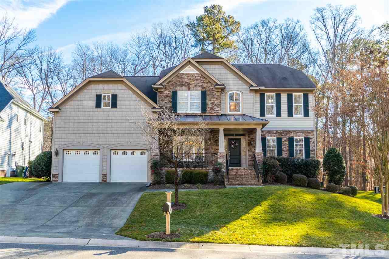 8240 Clarks Branch Drive Raleigh, NC 27613 - Photo 1 of 30 a view of a yard in front of house