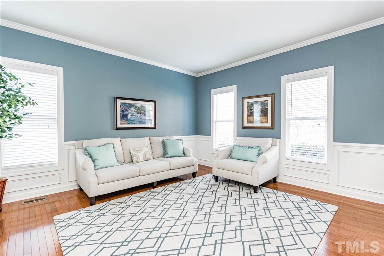 8240 Clarks Branch Drive Raleigh, NC 27613 - Photo 6 of 30 a living room with furniture and a window