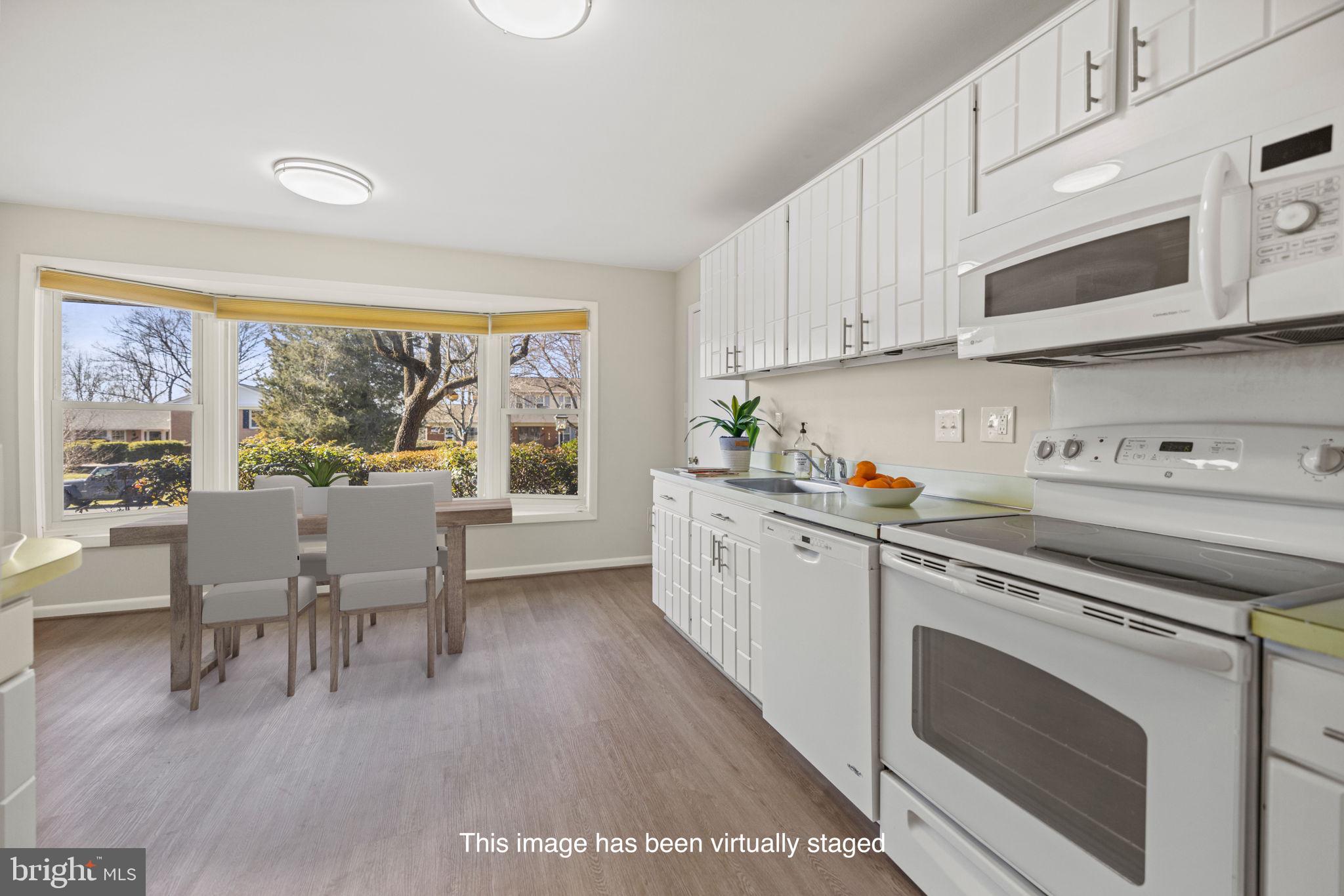 14801 Cobblestone Drive Silver Spring, MD 20905 - Photo 6 of 29 Sun-filled kitchen with breakfast area