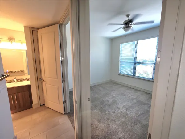 a view of an empty room and window