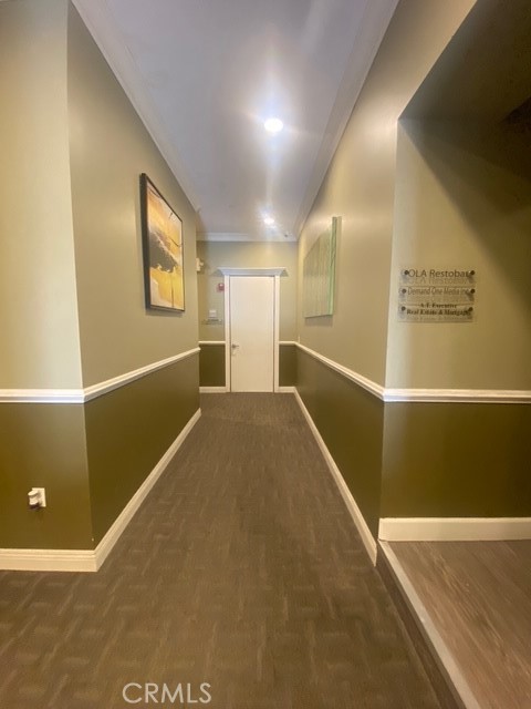 211 North Citrus Avenue, Unit 217A Covina, CA 91723 - Photo 4 of 10 a view of a hallway with an empty room