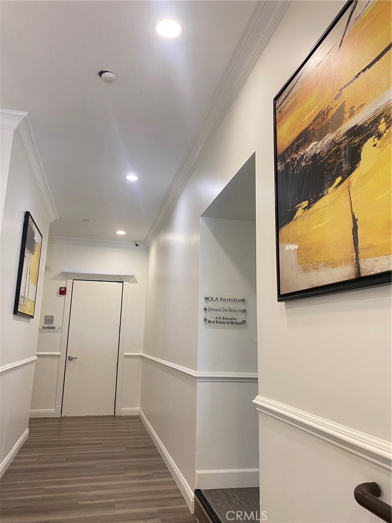 211 North Citrus Avenue, Unit 217A Covina, CA 91723 - Photo 6 of 10 a view of a hallway with wooden floor