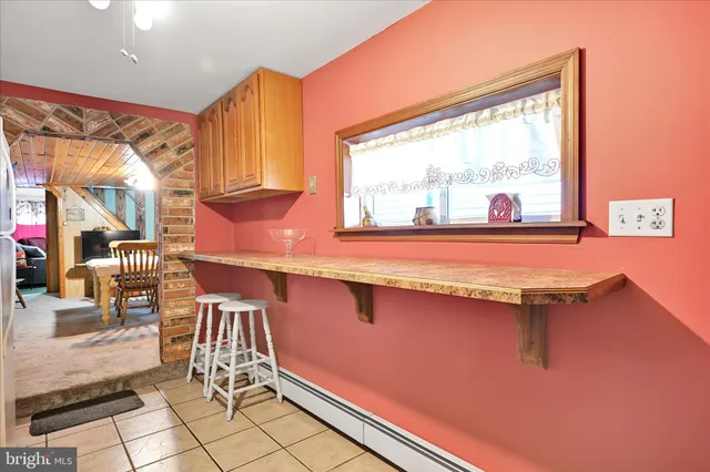 a kitchen with a sink and a window