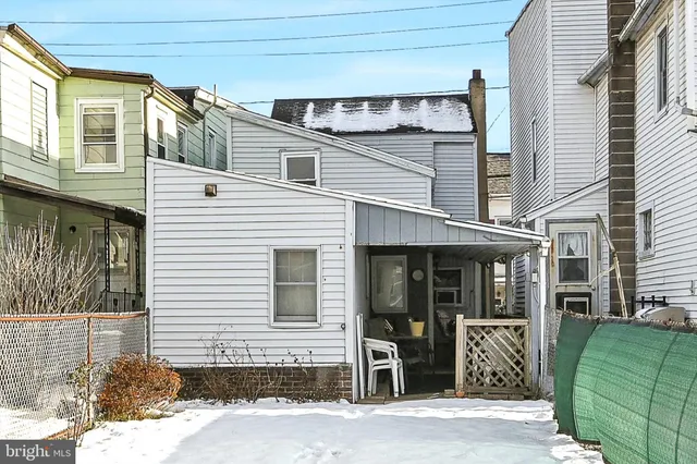 a view of a street with houses