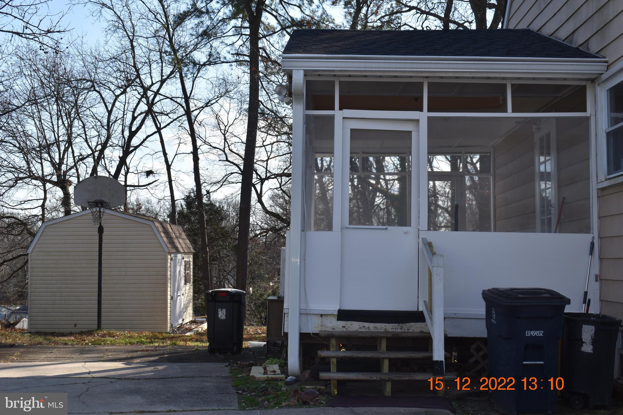 9113 Kinzer Street Lanham, MD 20706 - Photo 3 of 6 a front view of a house with garden