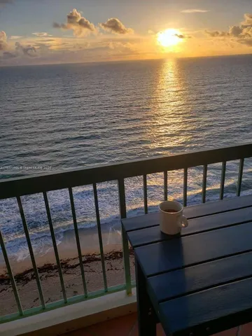 a view of ocean from a balcony