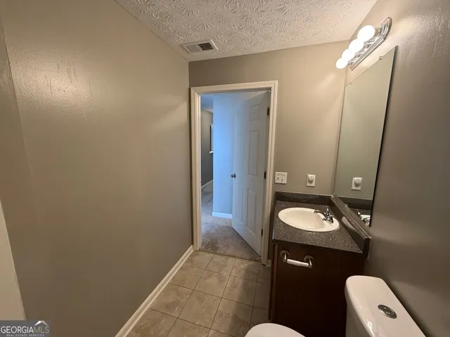 a bathroom with a toilet