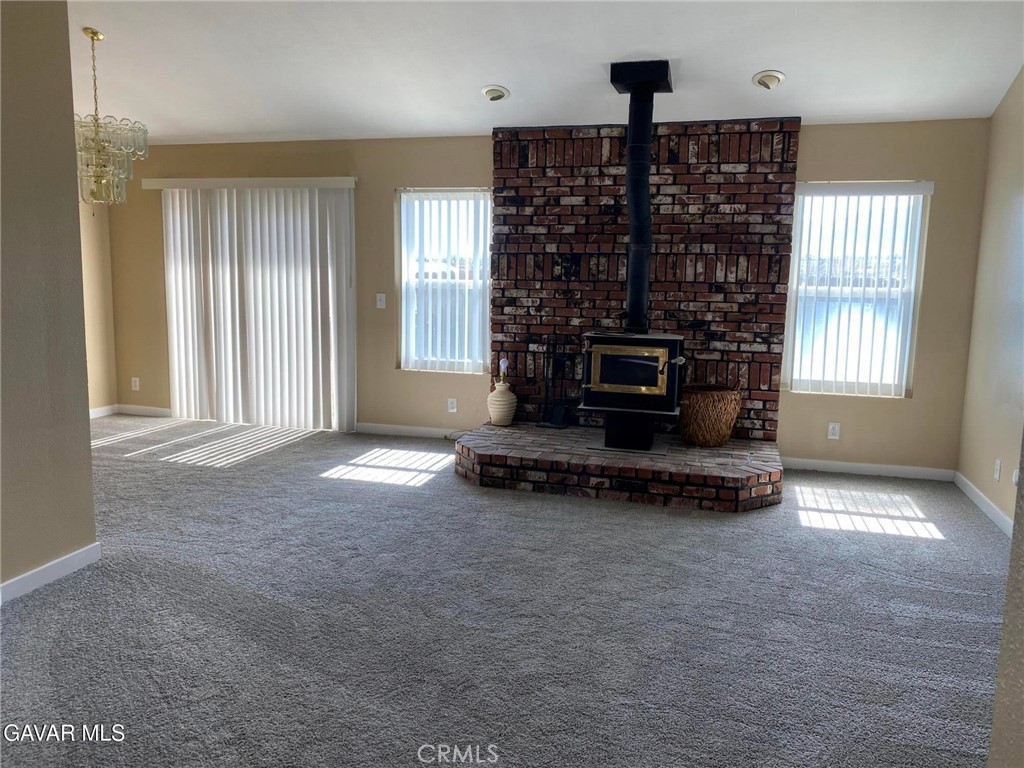 22601 Player Court Tehachapi, CA 93561 - Photo 3 of 10 a living room with a large window