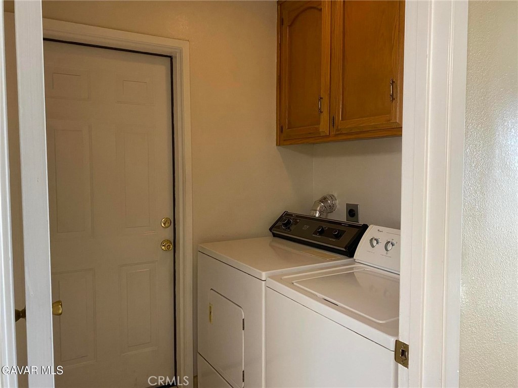 22601 Player Court Tehachapi, CA 93561 - Photo 6 of 10 a utility room with dryer and washer