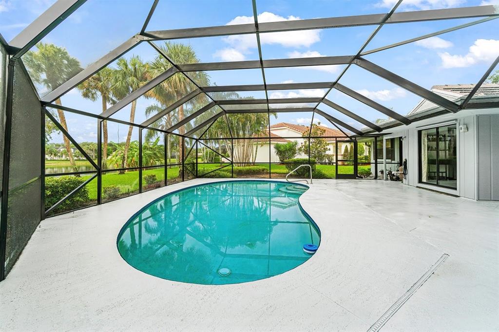 10158 Southeast Acorn Way Jupiter, FL 33469 - Photo 24 of 39 a view of a swimming pool with a patio