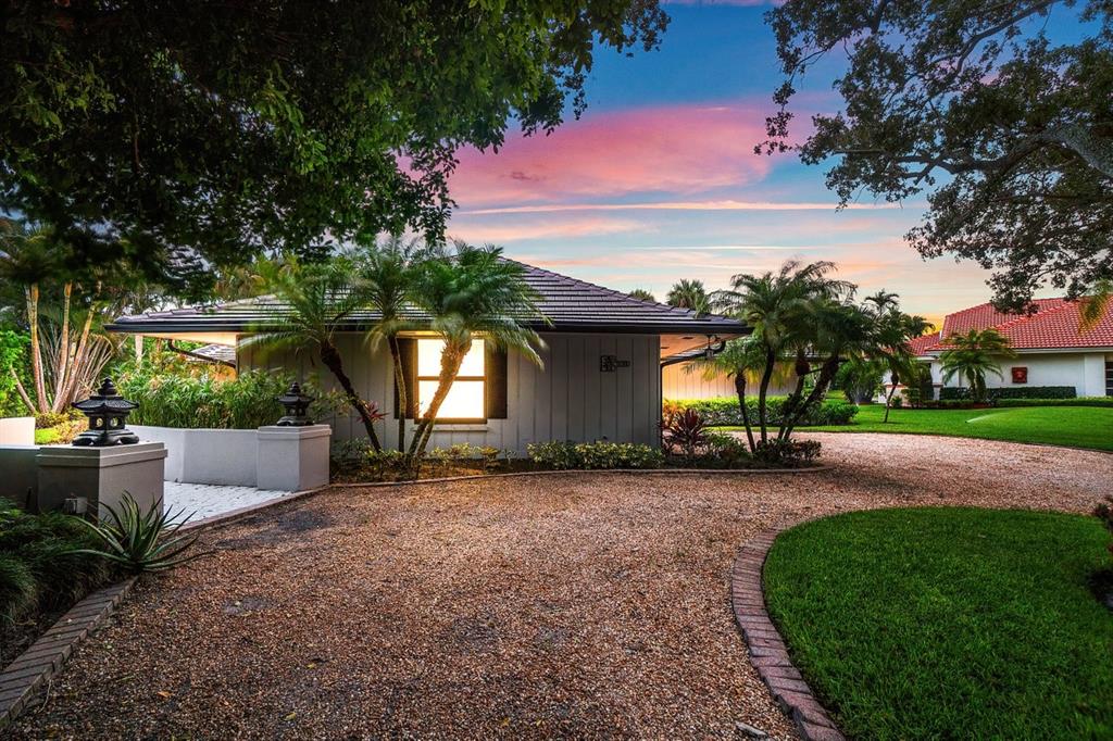 10158 Southeast Acorn Way Jupiter, FL 33469 - Photo 35 of 39 a view of a house with a yard and tree