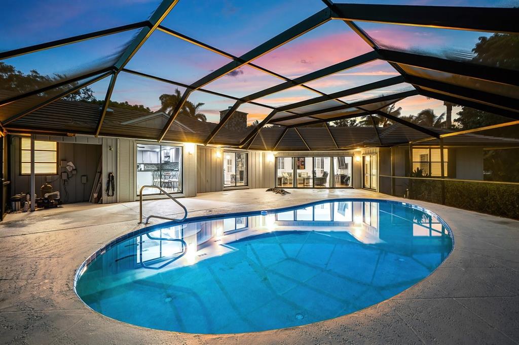 10158 Southeast Acorn Way Jupiter, FL 33469 - Photo 37 of 39 a view of a swimming pool with a patio