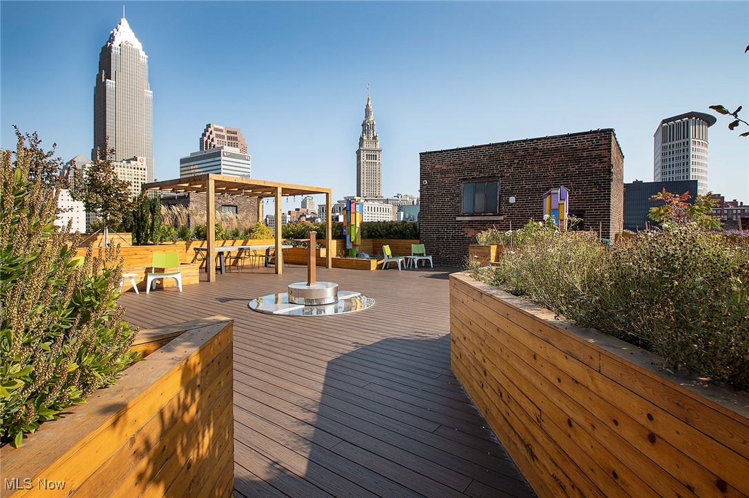 725 Johnson Court, Unit 220 Cleveland, OH 44113 - Photo 20 of 25 Rooftop deck featuring artwork, gazebo seating and casual seating areas